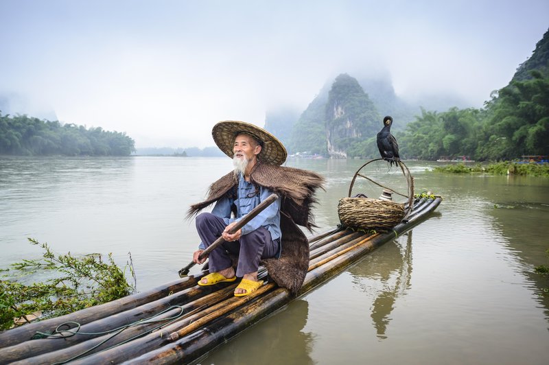 kitajski menih na čolnu (foto: shutterstock)
